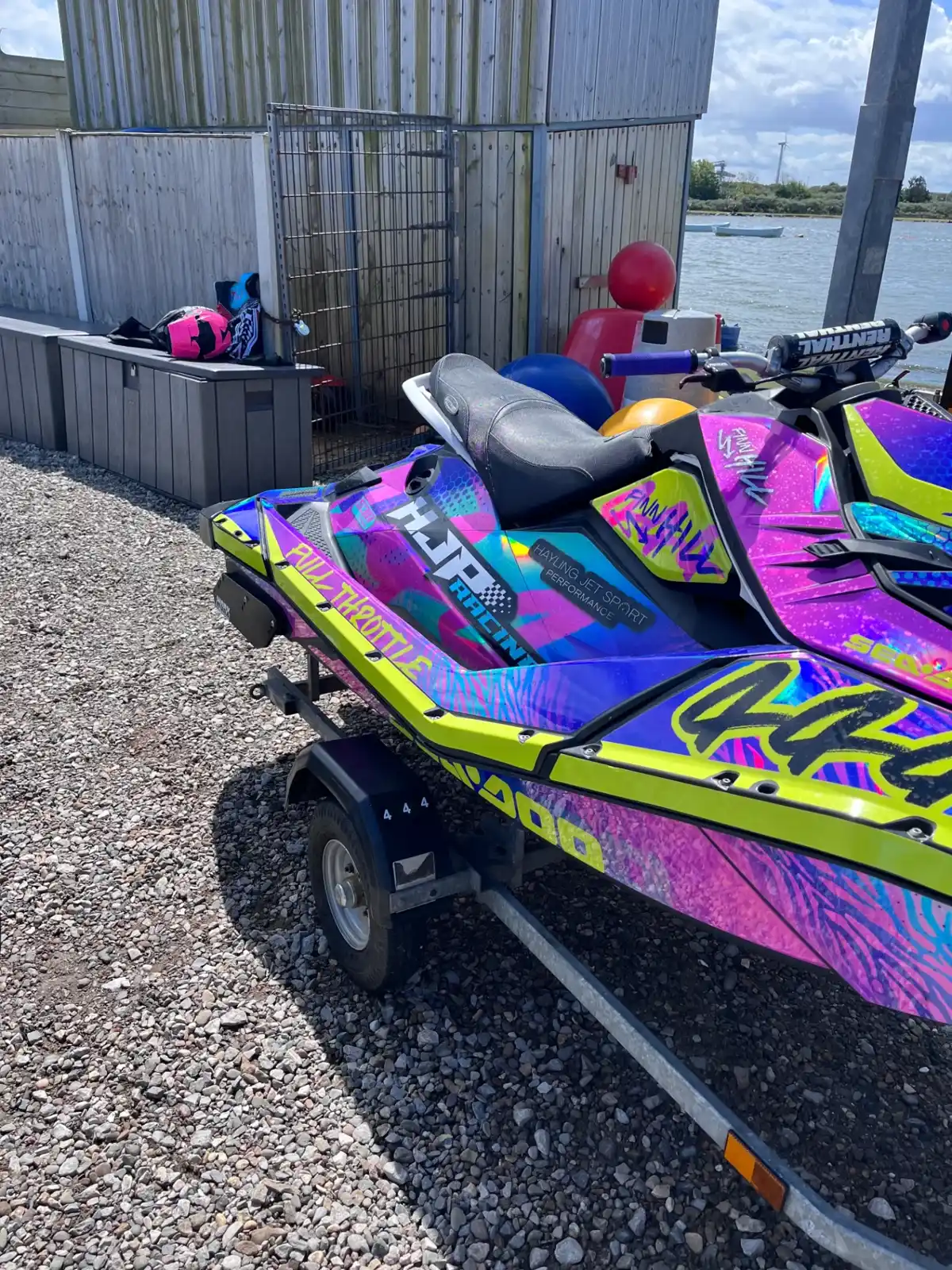 Two matching Finn Hill Sea-Doo Spark sticker kits at the slipway