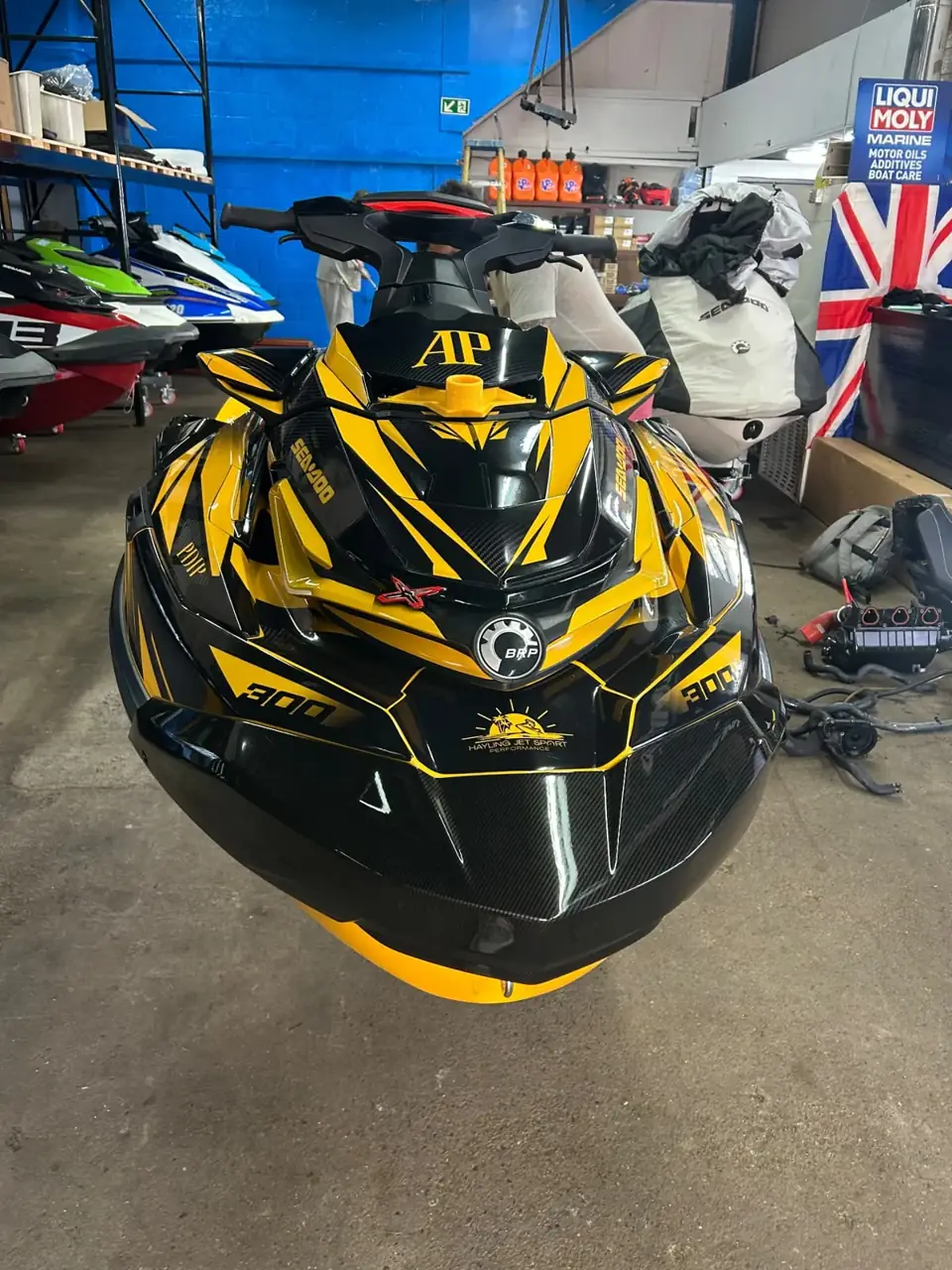 Front view of yellow and carbon Sea-Doo RXP-X 300 sticker kit