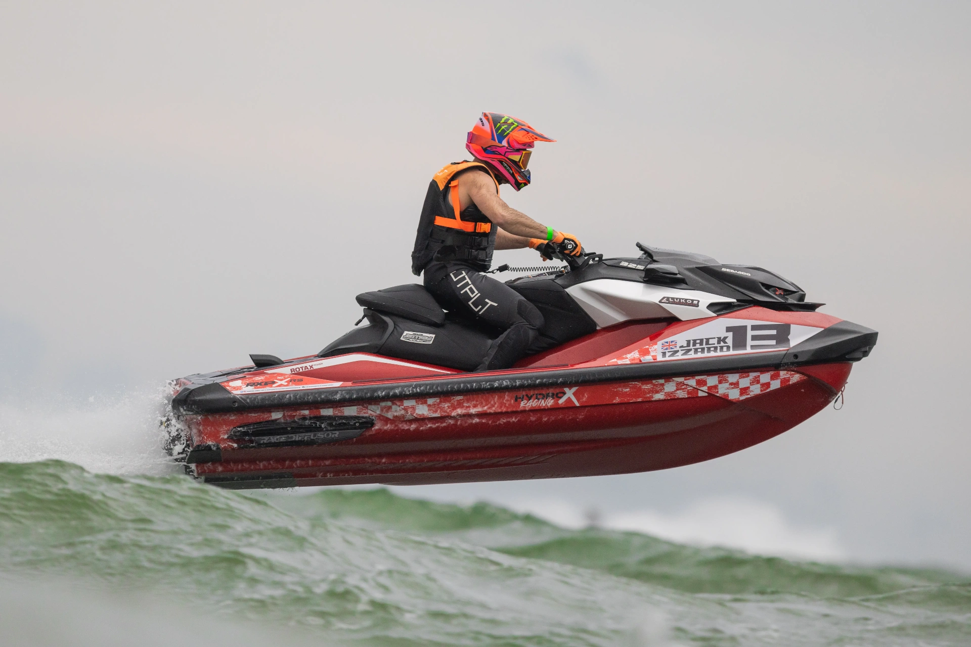Jack Izzard #13 Sea-Doo RXP-X race sticker kit mid-air — HydroX Racing