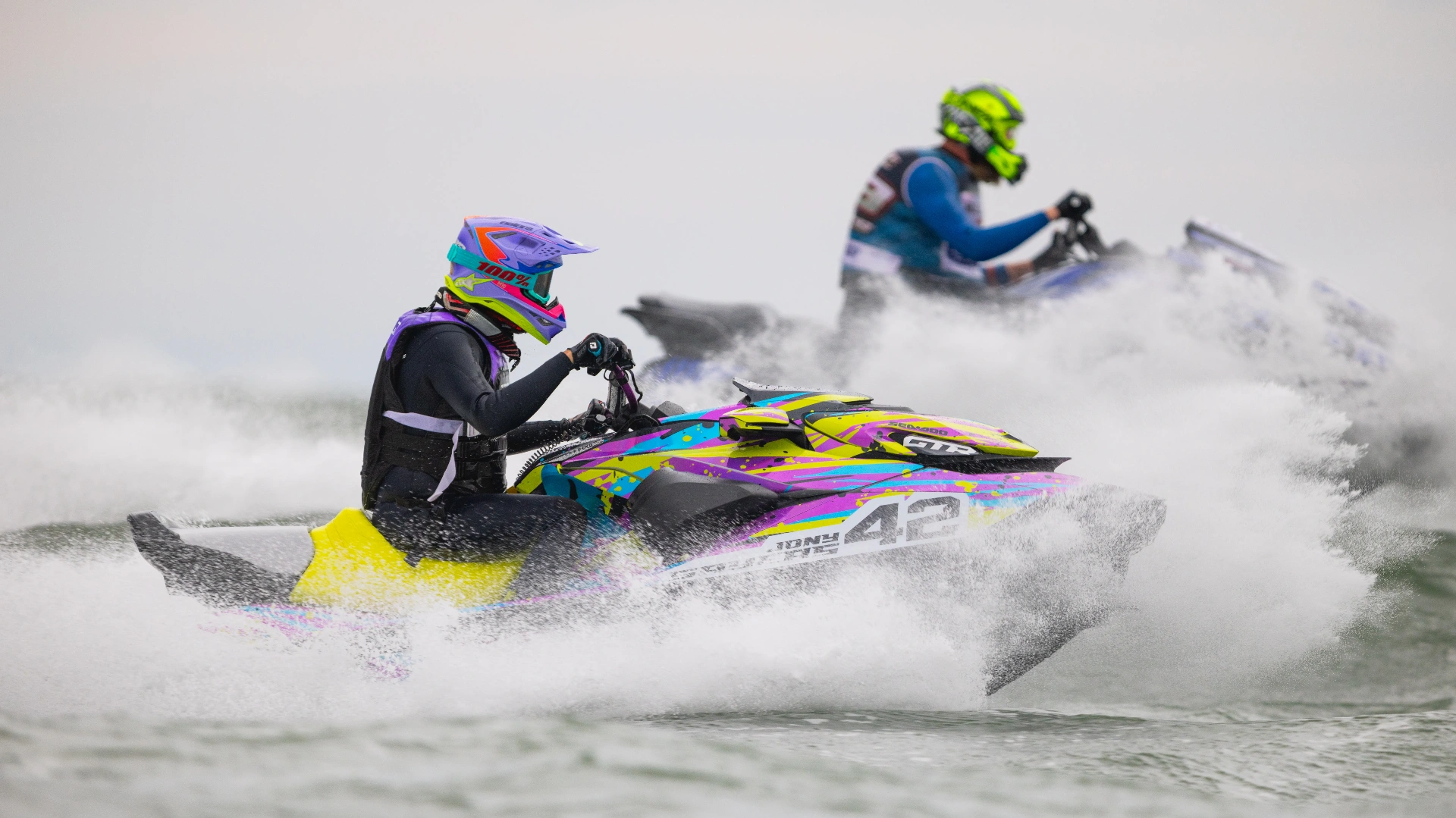 Jony Sayers #42 racing alongside another rider — Sea-Doo GTR