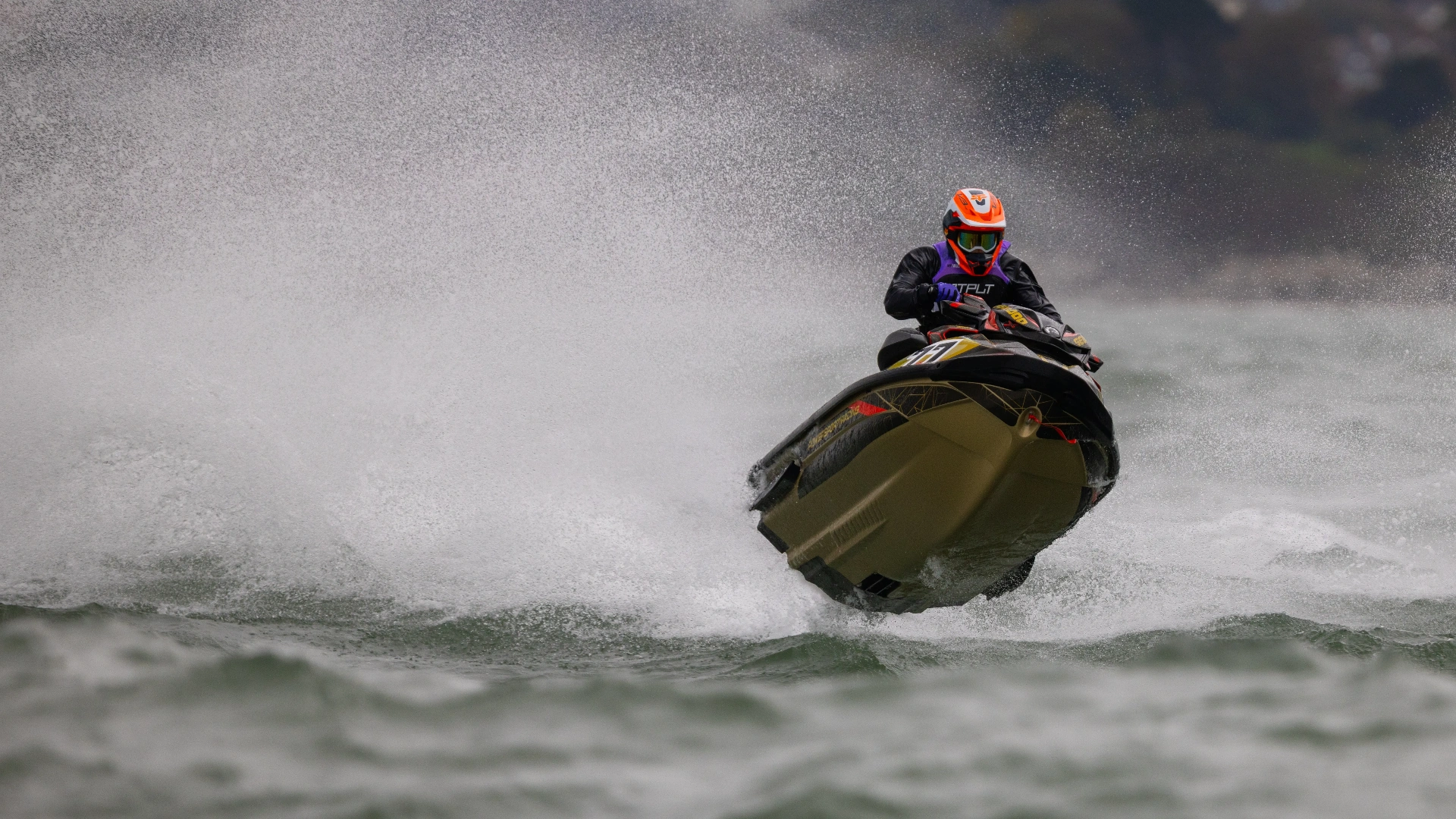 Jay Powersport #77 Sea-Doo RXP-X heading into spray