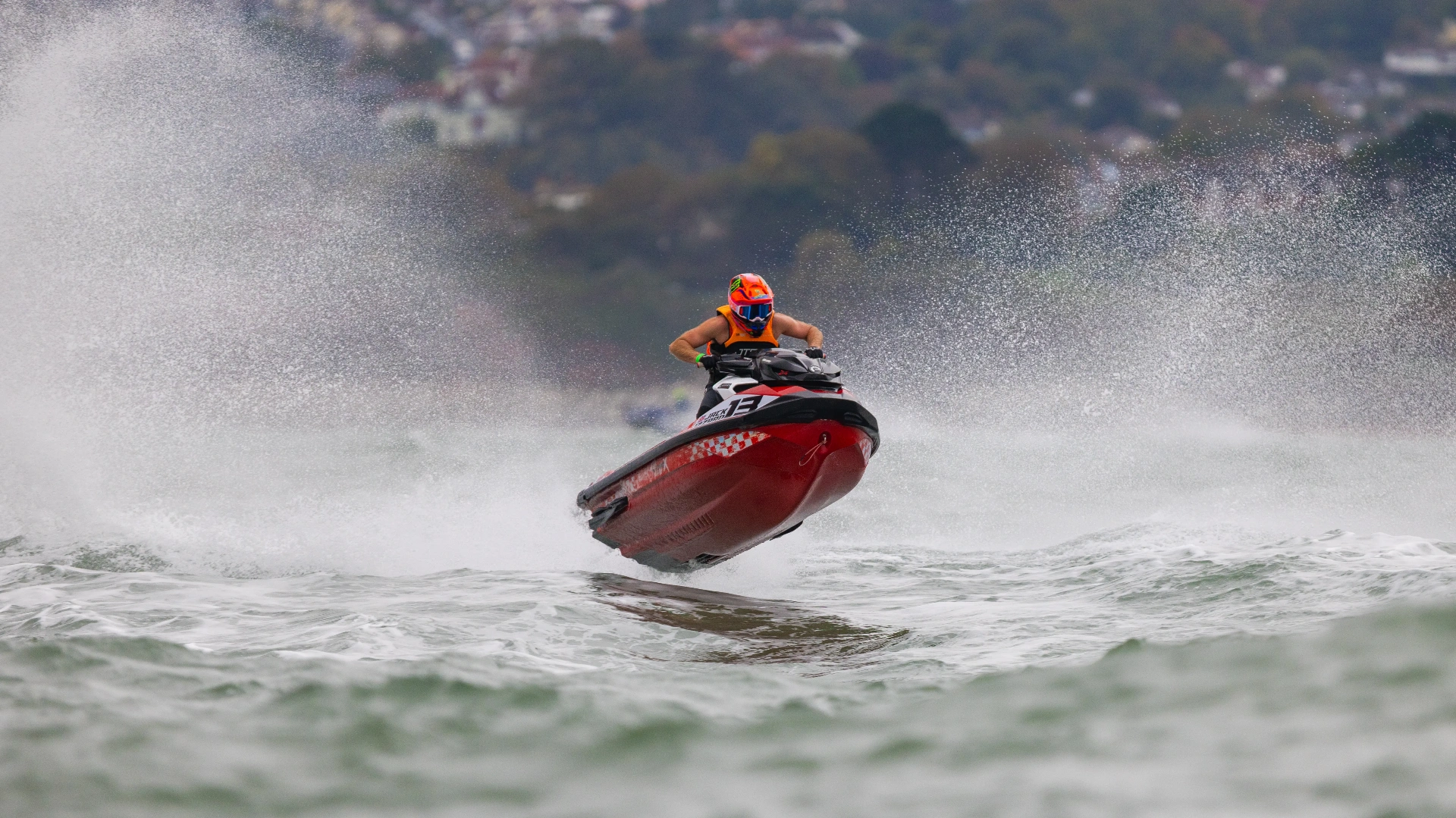 Jack Izzard #13 Sea-Doo RXP-X launching off a wave