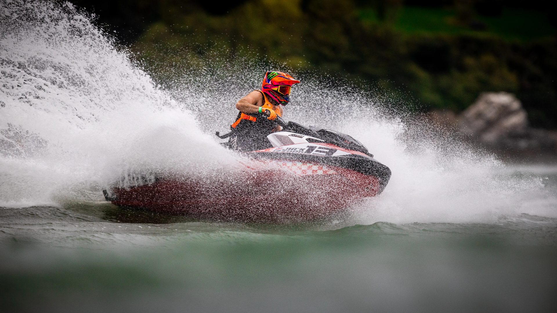 Jack Izzard #13 Sea-Doo RXP-X spraying water on race day
