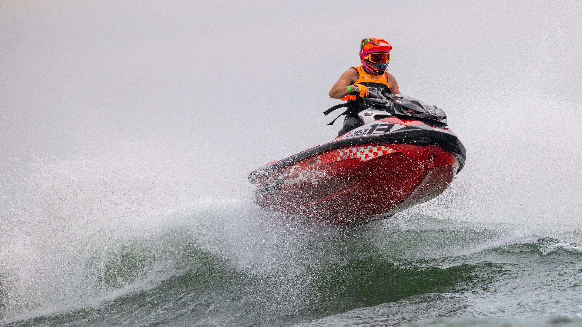 Jack Izzard #13 Sea-Doo RXP-X cutting through spray